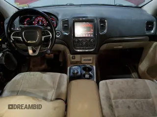 2014 Dodge Durango SXT with VIN 1C4RDJAG7EC586540, listed as a Copart auction lot 58769985 with 354,681 mi miles and Salvage title. Bid and sale history available at DreamBid. Image 8.