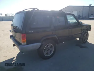 2000 Jeep Cherokee Classic with VIN 1J4FF58S3YL171454, listed as a Copart auction lot 42945485 with 218,721 mi miles and Salvage Title. Bid and sale history available at carsss.com. Image 3.