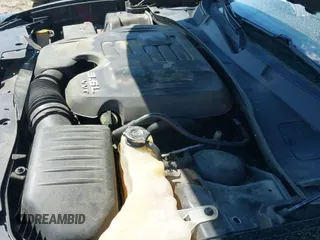 2016 Dodge Charger SE z VIN 2C3CDXFG4GH294267, wystawiony jako IAAI lot #41887393 z przebiegiem 117 649 mil mil oraz . Historia ofert i sprzedaży dostępna na DreamBid. Obrazek 19.