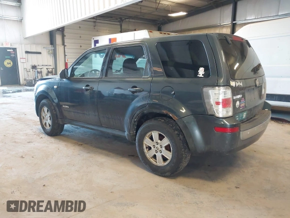 2008 Mercury Mariner with VIN 4M2CU81158KJ14013, listed as a IAAI auction lot 41305863 with 229,672 mi miles and . Bid and sale history available at DreamBid. Image 3.