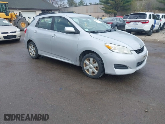 2009 Toyota Matrix with VIN 2T1KU40E99C006768, listed as a IAAI auction lot 42125813 with 163,832 mi miles. Bid and sale history available at carsss.com. Image 1.
