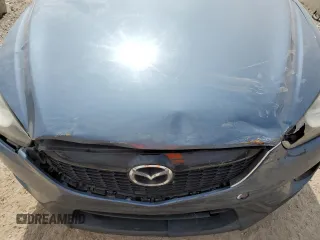 2015 Mazda CX-5 Sport z VIN JM3KE2BE8F0434116, wystawiony jako Copart lot #60712625 z przebiegiem 300 405 mil mil oraz Szkoda całkowita • Salvage title. Historia ofert i sprzedaży dostępna na DreamBid. Obrazek 12.