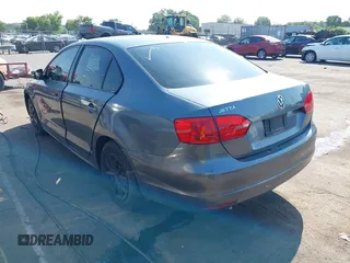 2014 Volkswagen Jetta S with VIN 3VW2K7AJ8EM231345, listed as a IAAI auction lot 42583321 with 129,988 mi miles and . Bid and sale history available at DreamBid. Image 3.