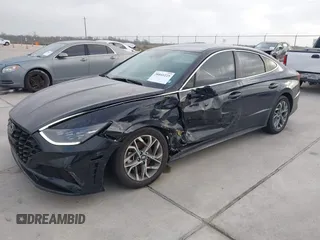 2023 Hyundai Sonata SEL with VIN KMHL64JA9PA329659, listed as a IAAI auction lot 38841225 with 4,772 mi miles and . Bid and sale history available at DreamBid. Image 2.