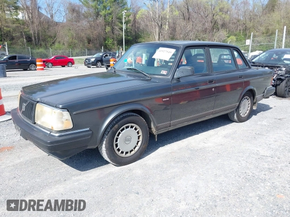 1992 Volvo 240 z VIN YV1AS8802N1469927, wystawiony jako IAAI lot #41927549 z przebiegiem 244 093 mil mil oraz . Historia ofert i sprzedaży dostępna na DreamBid. Obrazek 2.
