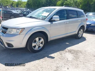 2012 Dodge Journey SXT z VIN 3C4PDCBGXCT390031, wystawiony jako IAAI lot #42281143 z przebiegiem 130 213 mil mil oraz . Historia ofert i sprzedaży dostępna na DreamBid. Obrazek 2.