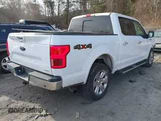 2020 Ford F-150 XL with VIN 1FTEW1EP4LKE68340, listed as a IAAI auction lot 41198215 with 95,450 mi miles and . Bid and sale history available at DreamBid. Image 4.