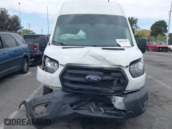 2020 Ford Transit Cargo with VIN 1FTBW3XG2LKB18281, listed as a IAAI auction lot 42022187 with 84,323 mi miles. Bid and sale history available at carsss.com. Image 12.
