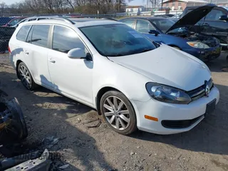 2014 Volkswagen Jetta SportWagen TDI w/Sunroof & Nav with VIN 3VWPL7AJ6EM603560, listed as a IAAI auction lot 41373968 with 123,250 mi miles. Bid and sale history available at carsss.com. Image 1.