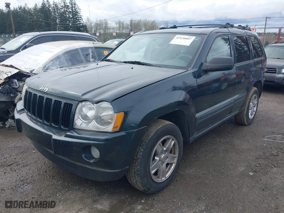 2005 Jeep Grand Cherokee Laredo with VIN 1J4HS48N45C524871, listed as a IAAI auction lot 41920807 with 169,633 mi miles. Bid and sale history available at carsss.com. Image 2.