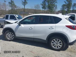 2013 Mazda CX-5 Touring with VIN JM3KE2CE0D0119032, listed as a IAAI auction lot 41891556 with 174,745 mi miles and . Bid and sale history available at carsss.com. Image 14.