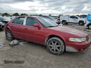 2002 Cadillac Seville Touring STS z VIN 1G6KY54902U132357, wystawiony jako Copart lot #42008795 z przebiegiem 111 014 mil mil oraz Szkoda całkowita • Salvage title. Historia ofert i sprzedaży dostępna na DreamBid. Obrazek 4.