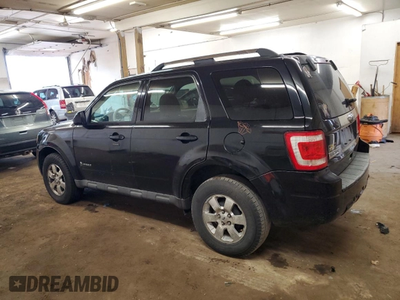2010 Ford Escape Hybrid with VIN 1FMCU4K30AKC25228, listed as a Copart auction lot 60322835 with 207,629 mi miles and Salvage title. Bid and sale history available at DreamBid. Image 2.