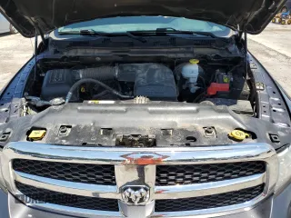 2021 Ram 1500 Tradesman with VIN 1C6RR6FG4MS524919, listed as a Copart auction lot 61338335 with 126,486 mi miles and Salvage title. Bid and sale history available at DreamBid. Image 11.