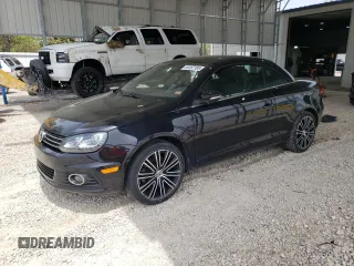 2013 Volkswagen Eos Komfort with VIN WVWBW8AH1DV001953, listed as a Copart auction lot 54167185 with 118,696 mi miles and Clean Title. Bid and sale history available at DreamBid. Image 1.