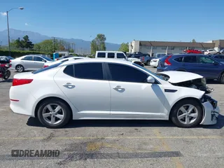 2015 Kia Optima LX z VIN KNAGM4A71F5594595, wystawiony jako IAAI lot #42226773 z przebiegiem 133 194 mil mil oraz . Historia ofert i sprzedaży dostępna na DreamBid. Obrazek 13.