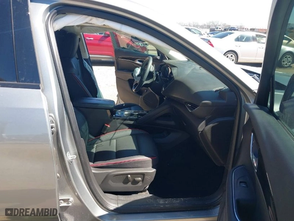 2023 Buick Envision Essence with VIN LRBFZNR42PD018598, listed as a IAAI auction lot 41761411 with 65,685 mi miles. Bid and sale history available at carsss.com. Image 5.