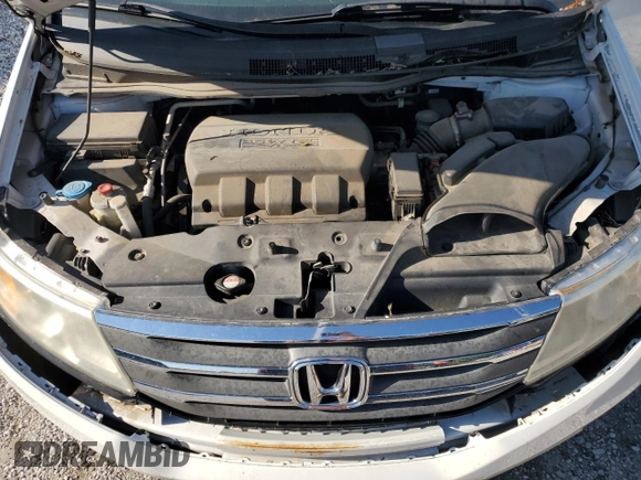 2013 Honda Odyssey Touring with VIN 5FNRL5H90DB003003, listed as a Copart auction lot 58519345 with 259,383 mi miles and Salvage title. Bid and sale history available at DreamBid. Image 12.