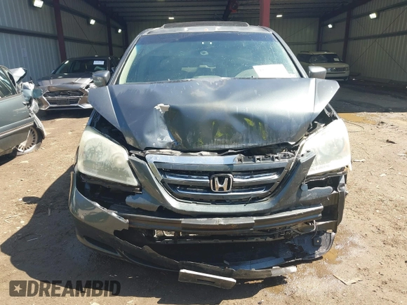 2005 Honda Odyssey EX-L with VIN 5FNRL387X5B069823, listed as a IAAI auction lot 41883007 with 267,250 mi miles and . Bid and sale history available at DreamBid. Image 12.