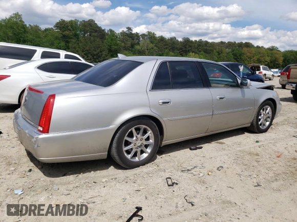 2009 Cadillac DTS 1SA z VIN 1G6KD57Y69U114700, wystawiony jako Copart lot #56007485 z przebiegiem 158 849 mil mil oraz Szkoda całkowita • Salvage title. Historia ofert i sprzedaży dostępna na DreamBid. Obrazek 3.