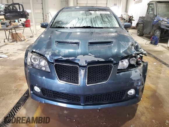 2009 Pontiac G8 with VIN 6G2ER57789L161792, listed as a Copart auction lot 43455795 with 127,236 mi miles and Salvage Title. Bid and sale history available at DreamBid. Image 5.