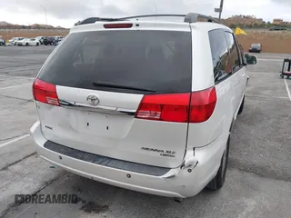 2004 Toyota Sienna XLE with VIN 5TDZA22C94S084569, listed as a IAAI auction lot 41482040 with 210,157 mi miles and . Bid and sale history available at DreamBid. Image 4.