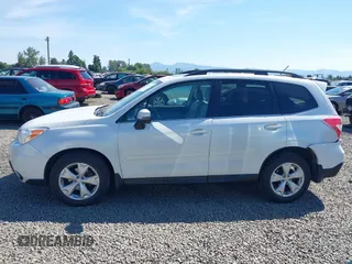 2014 Subaru Forester Touring with VIN JF2SJAPC4EH539193, listed as a IAAI auction lot 42444513 with 159,639 mi miles and . Bid and sale history available at DreamBid. Image 14.
