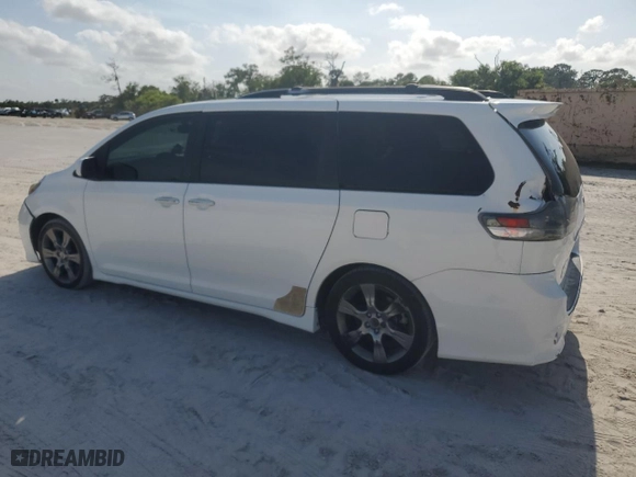 2015 Toyota Sienna SE with VIN 5TDXK3DC6FS625054, listed as a Copart auction lot 52951115 with 251,539 mi miles and Clean Title. Bid and sale history available at carsss.com. Image 2.