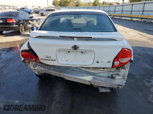 2001 Nissan Maxima SE 20th Anniversary. z VIN JN1CA31A81T313061, wystawiony jako Copart lot #72608504 z przebiegiem 200 484 mil mil oraz Szkoda całkowita • Salvage title. Historia ofert i sprzedaży dostępna na DreamBid. Obrazek 6.