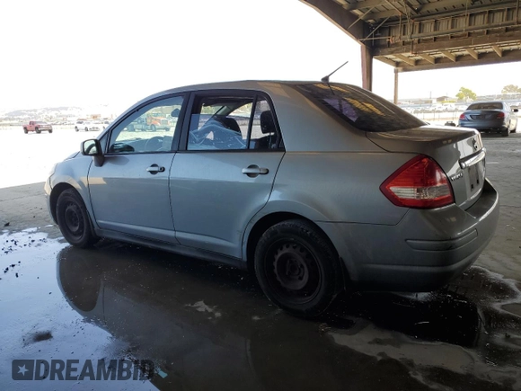 2011 Nissan Versa S with VIN 3N1BC1AP0BL360766, listed as a Copart auction lot 62177555 with 188,160 mi miles and Salvage title. Bid and sale history available at DreamBid. Image 2.