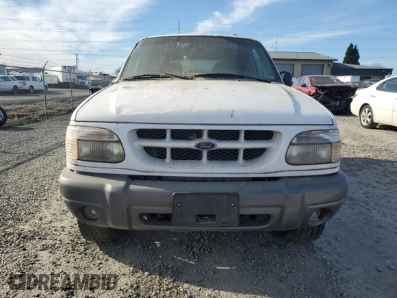 1999 Ford Explorer Sport with VIN 1FMYU24X7XUC50909, listed as a Copart auction lot 50254305 with 83,605 mi miles and Salvage title. Bid and sale history available at DreamBid. Image 5.