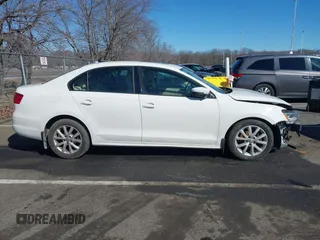 2012 Volkswagen Jetta Sedan SE w/Convenience PZEV with VIN 3VWDP7AJ2CM374783, listed as a IAAI auction lot 41636257 with 124,458 mi miles. Bid and sale history available at carsss.com. Image 13.