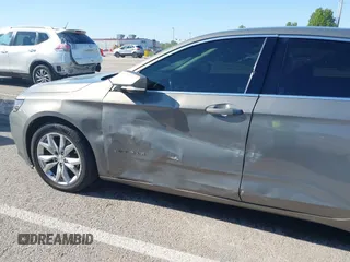 2017 Chevrolet Impala LT with VIN 2G1105S33H9184109, listed as a IAAI auction lot 42067055 with 222,167 mi miles and . Bid and sale history available at DreamBid. Image 6.