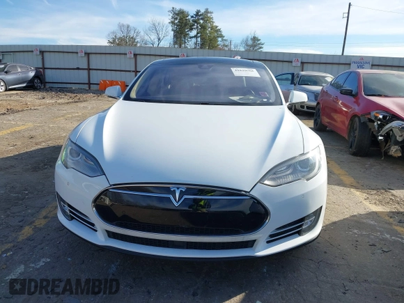 2014 Tesla Model S 60 with VIN 5YJSA1H13EFP62451, listed as a IAAI auction lot 41639068 with 88,000 mi miles and . Bid and sale history available at DreamBid. Image 12.