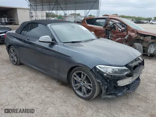 2015 BMW 2 Series M235i with VIN WBA1M1C53FV393216, listed as a IAAI auction lot 40975728 with 115,887 mi miles. Bid and sale history available at carsss.com. Image 1.