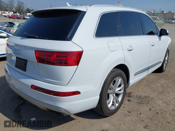 2019 Audi Q7 Premium with VIN WA1AAAF74KD004991, listed as a IAAI auction lot 42180183 with 53,188 mi miles and . Bid and sale history available at DreamBid. Image 4.