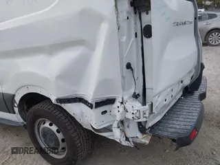 2015 Ford Transit Cargo with VIN 1FTNR1ZM2FKB13159, listed as a IAAI auction lot 41331967 with 152,715 mi miles and . Bid and sale history available at DreamBid. Image 17.