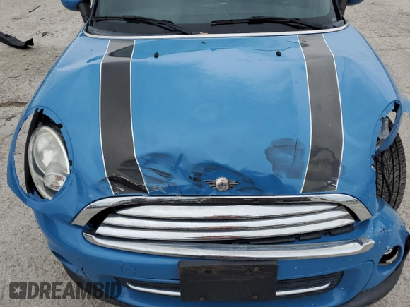 2014 MINI Convertible z VIN WMWZN3C57ET570016, wystawiony jako Copart lot #54565815 z przebiegiem 74 742 mil mil oraz Szkoda całkowita • Salvage title. Historia ofert i sprzedaży dostępna na DreamBid. Obrazek 11.