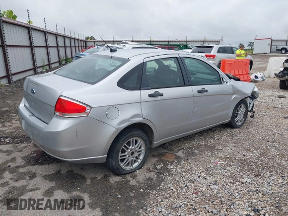 2010 Ford Focus SE with VIN 1FAHP3FN7AW200994, listed as a IAAI auction lot 39878172 with 146,211 mi miles. Bid and sale history available at carsss.com. Image 4.