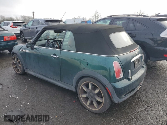 2007 MINI Convertible S with VIN WMWRH33517TL95143, listed as a Copart auction lot 88068045 with 115,827 mi miles and Salvage title. Bid and sale history available at DreamBid. Image 2.