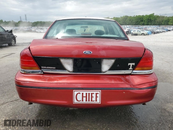 1999 Ford Crown Victoria Police with VIN 2FAFP71W7XX167653, listed as a Copart auction lot 54241955 with 81,967 mi miles and Salvage Title. Bid and sale history available at carsss.com. Image 6.