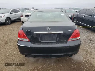 2007 Acura RL Technology z VIN JH4KB16697C002275, wystawiony jako Copart lot #82517284 z przebiegiem 200 857 mil mil oraz Czysty tytuł • Clean title. Historia ofert i sprzedaży dostępna na DreamBid. Obrazek 6.