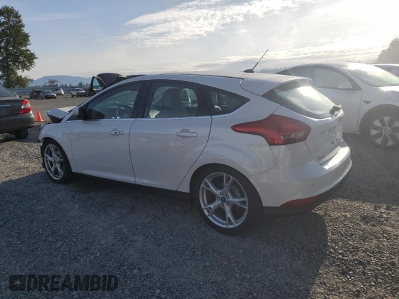 2015 Ford Focus Titanium z VIN 1FADP3N24FL262321, wystawiony jako Copart lot #59635525 z przebiegiem Nie podano mil oraz Szkoda całkowita • Salvage title. Historia ofert i sprzedaży dostępna na DreamBid. Obrazek 2.