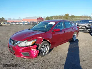 2016 Nissan Altima 2.5 SL with VIN 1N4AL3APXGC209656, listed as a IAAI auction lot 41017105 with 145,040 mi miles. Bid and sale history available at carsss.com. Image 2.