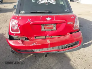 2013 MINI Hardtop S with VIN WMWSV3C56DT392499, listed as a IAAI auction lot 41855073 with 55,403 mi miles and . Bid and sale history available at DreamBid. Image 6.