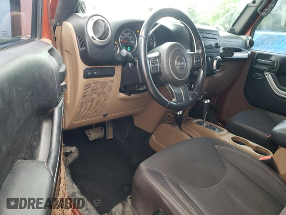 2014 Jeep Wrangler Rubicon with VIN 1C4BJWCG2EL303420, listed as a Copart auction lot 63550985 with 87,175 mi miles and Salvage title. Bid and sale history available at DreamBid. Image 8.