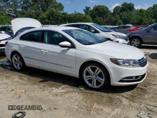 2013 Volkswagen CC R-Line with VIN WVWBP7AN1DE513242, listed as a Copart auction lot 58666524 with 53,460 mi miles and Salvage Title. Bid and sale history available at carsss.com. Image 4.