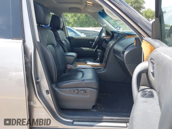 2012 Infiniti QX56 7-passenger z VIN JN8AZ2NF9C9517675, wystawiony jako IAAI lot #42138696 z przebiegiem 129 478 mil mil oraz . Historia ofert i sprzedaży dostępna na DreamBid. Obrazek 5.