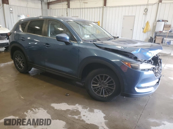 2020 Mazda CX-5 Touring with VIN JM3KFBCM2L0853447, listed as a Copart auction lot 54621675 with 88,649 mi miles and Non Repairable. Bid and sale history available at carsss.com. Image 4.