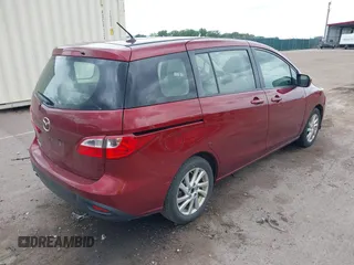 2012 Mazda 5 Sport with VIN JM1CW2BL4C0143780, listed as a IAAI auction lot 42362211 with 201,537 mi miles and . Bid and sale history available at DreamBid. Image 4.